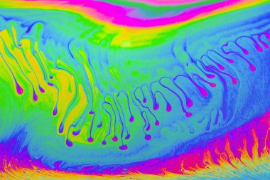 Gökkuşağı renkleri. Psikedelik çok renkli desenler arka planı. Sabun köpüklerinin makro fotoğraf çekimi