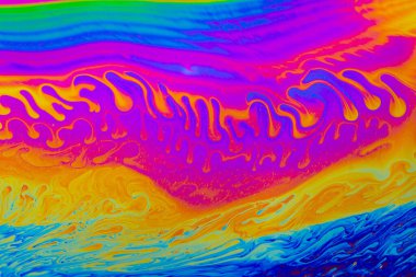 Gökkuşağı renkleri. Psikedelik çok renkli desenler arka planı. Sabun köpüklerinin makro fotoğraf çekimi