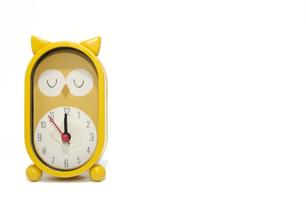 Yellow owl-shaped alarm clock alarm clock on white background.copy space — Stock Photo, Image