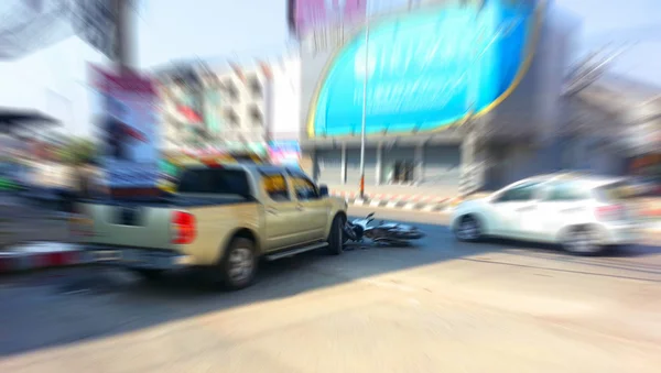 Pickup crashes motorcycle on the road — Stock Photo, Image