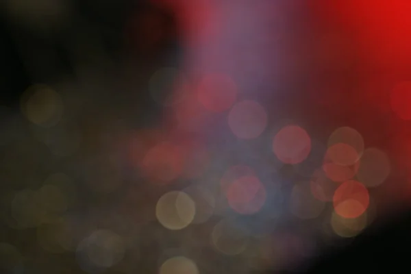 Bokeh colorido oscuro con luz roja para el concepto de vida nocturna — Foto de Stock