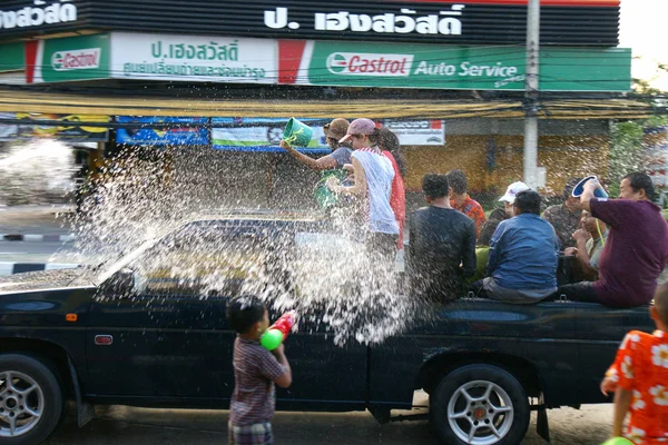 People in a Songkran water fight festival in Chiangmai, Thailand — Stock Photo, Image