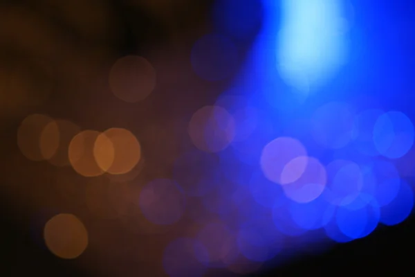 Bokeh colorato scuro con luce blu per il concetto di vita notturna — Foto Stock