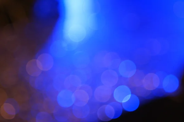 Donkere kleurrijke bokeh met blauw licht voor nachtleven concept — Stockfoto