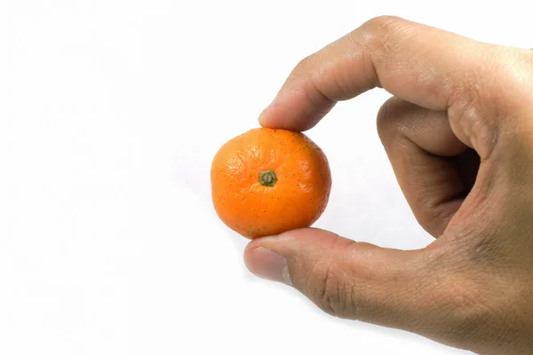 Права рука тримає апельсин — стокове фото