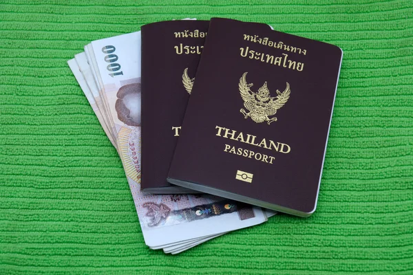 Thailand passport and Thai money — Stock Photo, Image