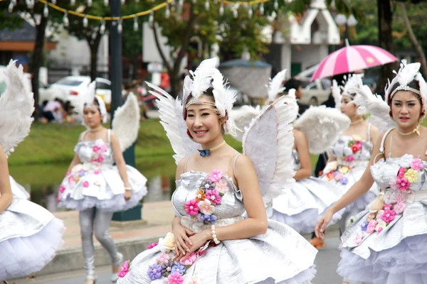 Thai people on the parade in ChiangMai Flower Festival 2013 Stock Photo