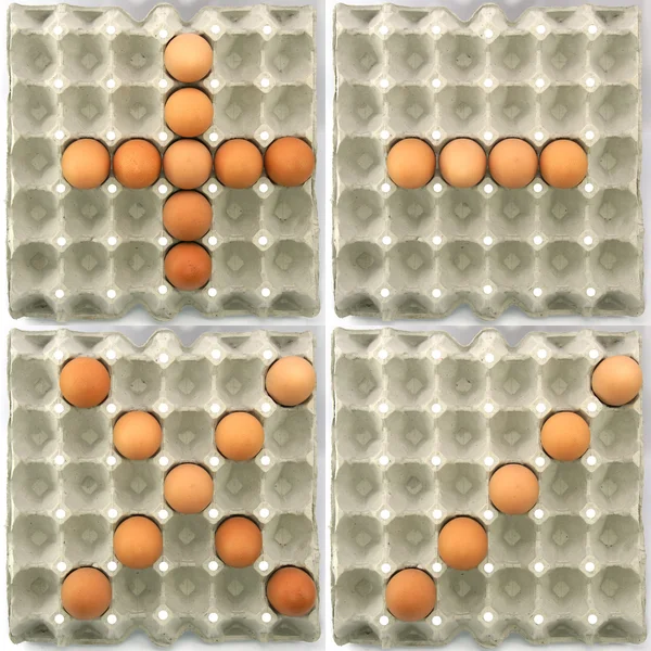 Plus-Minus-Multiply-Divide symbol s show by eggs — Stock Photo, Image