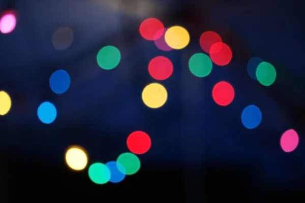 Blur luces de Navidad de colores fondo bokeh — Foto de Stock