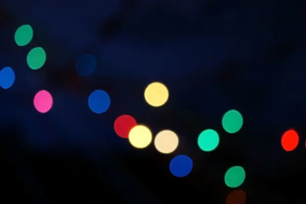 Blur luces de Navidad de colores fondo bokeh — Foto de Stock