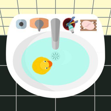 Sarı lastik ördek bir banyo bir lavabo üzerinde Üstten Görünüm