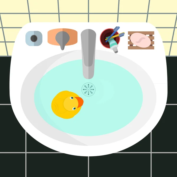 Sarı lastik ördek bir banyo bir lavabo üzerinde Üstten Görünüm