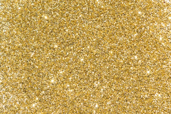 Guld paljetter. Ljusa shine. Gult pulver. Glitter. Lysande bakgrund — Stockfoto