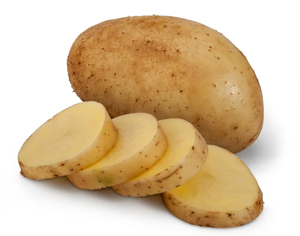 Patata cruda en rodajas y patata completa —  Fotos de Stock