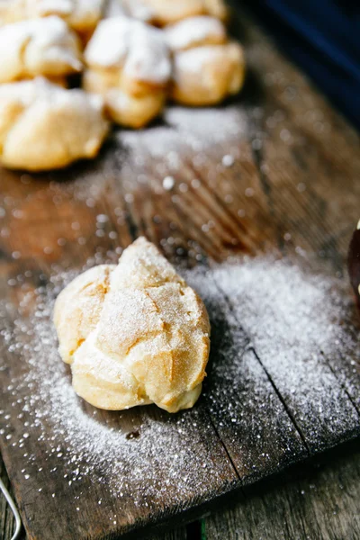 Profiteroles and coffee — Stock Photo, Image