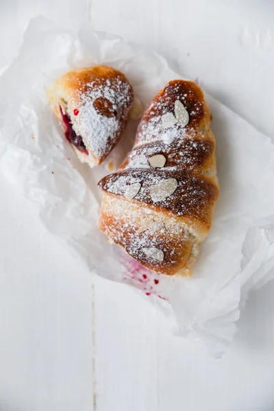 Croissant with cherries — Stock Photo, Image