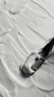 Makro beyaz kozmetik krem desenli saç kremi.