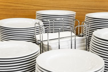 Buffet platters stacked around napkin display clipart