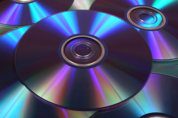 Closeup image of DVDs nad CDs