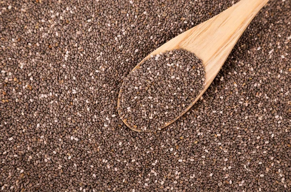 Chia semena s dřevěnou lžící — Stock fotografie