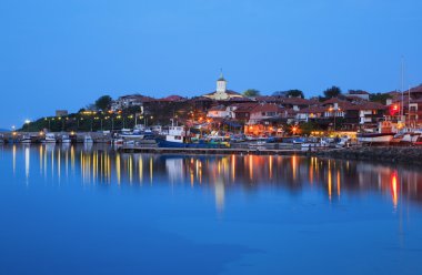 The harbor of the old town of Nessebar at night, Bulgaria clipart