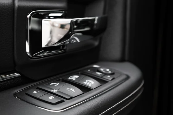 Door control panel in a modern car