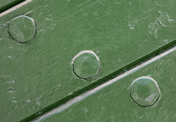 Grön målat trä och spik textur bakgrund — Stockfoto