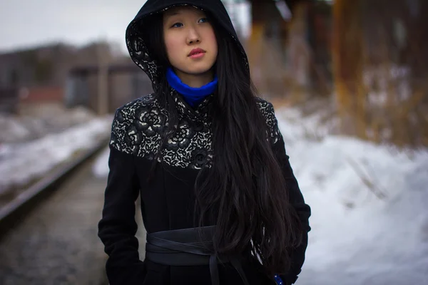 Sad girl in coat — Stock Photo, Image