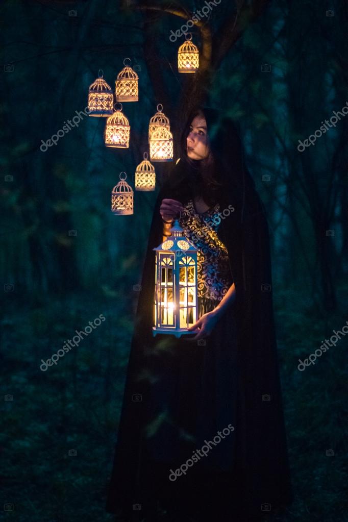 Girl with a lantern at night in the forest Stock Photo by ©Edinorog12 67391763