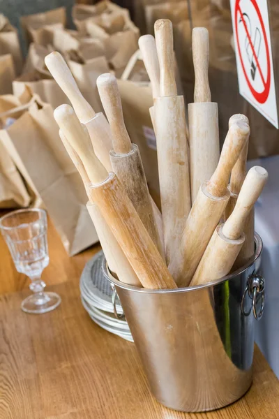 Rolling pins are in the bucket in the kitchen — Stock Photo, Image