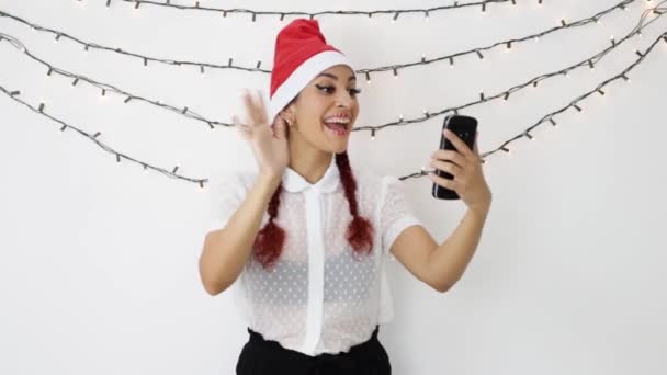 Young Girl Red Christmas Hat Making Video Call Cell Phone — Stock Video