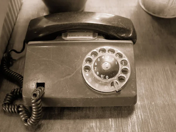 Picture of an old phone in vintage style.