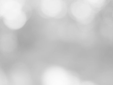 Parlayan beyaz bokeh resmi bir arkaplan illüstrasyonu olarak kullanılabilir veya bir reklama metin eklemek için.