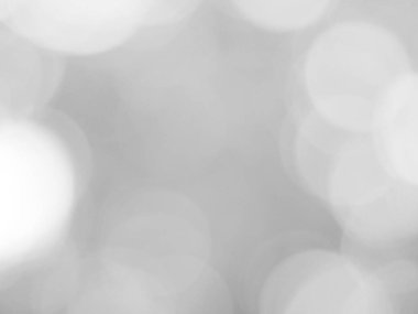 Aydınlatılmış beyaz bokeh resmi arkaplan illüstrasyonu olarak kullanılabilir veya metin eklenebilir.