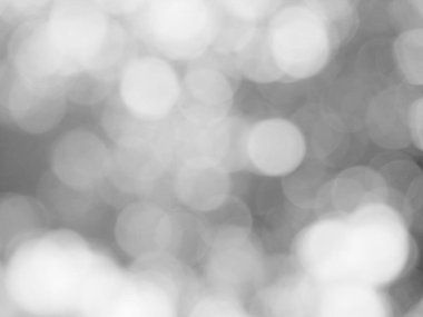 Aydınlatılmış beyaz bokeh resmi arkaplan illüstrasyonu olarak kullanılabilir veya metin eklenebilir.