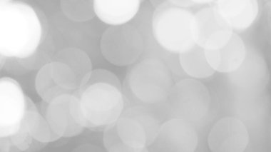 Aydınlatılmış beyaz bokeh resmi arkaplan illüstrasyonu olarak kullanılabilir veya metin eklenebilir.
