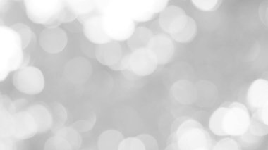 Aydınlatılmış beyaz bokeh resmi arkaplan illüstrasyonu olarak kullanılabilir veya metin eklenebilir.