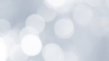 Aydınlatılmış beyaz bokeh resmi arkaplan illüstrasyonu olarak kullanılabilir veya metin eklenebilir.