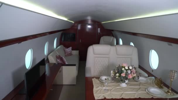 Interior cabin of private luxury vip jet. Inside of airplane plane — Vídeos de Stock