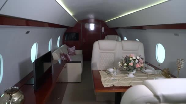 Interior cabin of private luxury vip jet. Inside of airplane plane — Vídeos de Stock