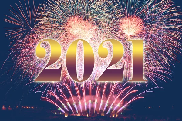 toast to the new year with fireworks. New year with fireworks 2021.Happy new year 2021.Number 2021 in modern concept. Text 2021.