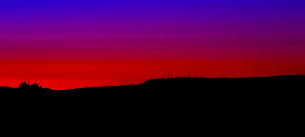 Ηλιοβασίλεμα κόκκινο και μπλε — Φωτογραφία Αρχείου