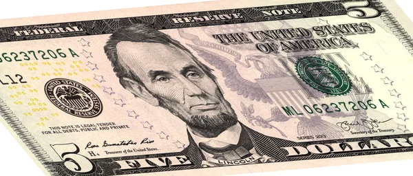 Beş dolar izole beyaz zemin üzerine, yakın çekim.