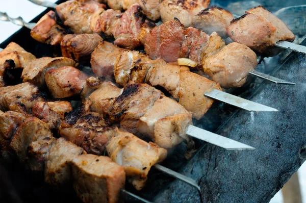 Grilled meat on skewers — Stock Photo, Image