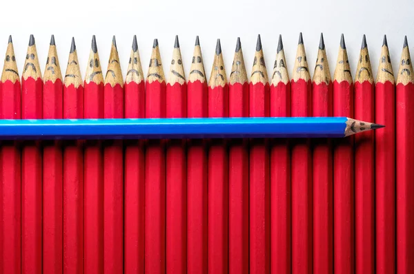 Merry pencil among sad — Stock Photo, Image