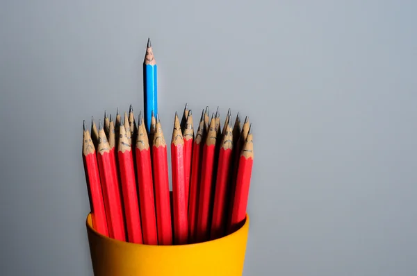 Merry pencil among sad — Stock Photo, Image