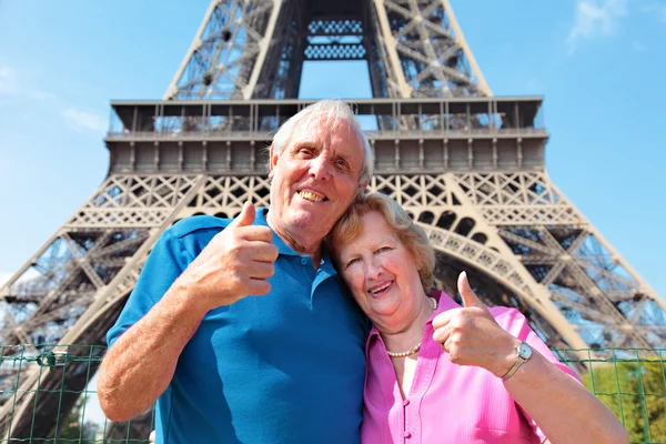 Senior couple in front of Eiffel Tower