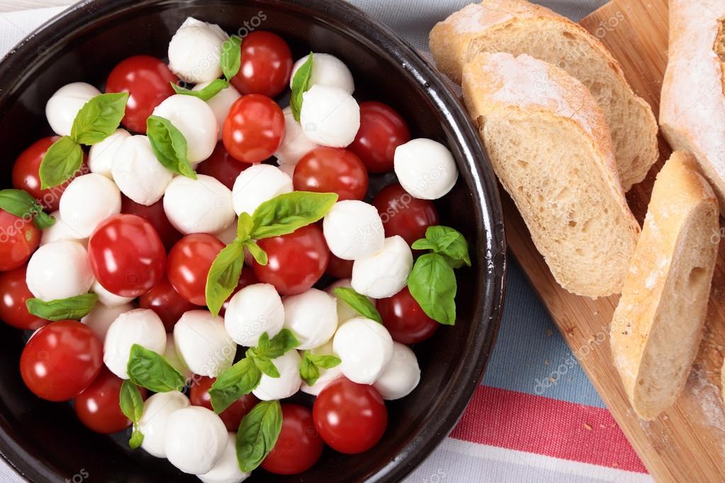 Caprese salad with mozzarella, tomato and basil