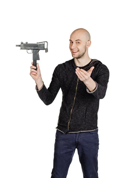 Ung man med vapen — Stockfoto