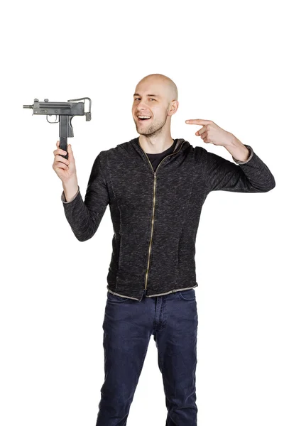 Junger Mann mit Waffe — Stockfoto